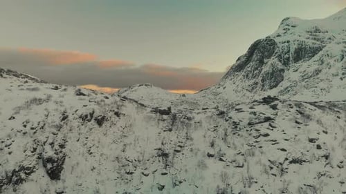 Snowy Mountains Landscape Aerial View at Sunrise