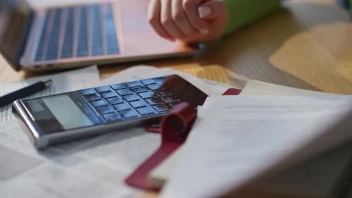 Calculator and Laptop For Office Financial Work