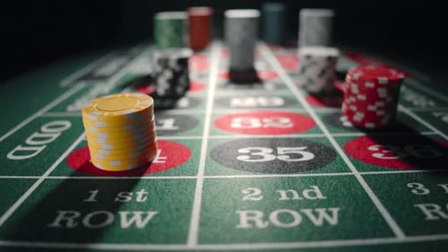 Close Up of Bet Stacks of Chips on a Green Casino Roulette Table