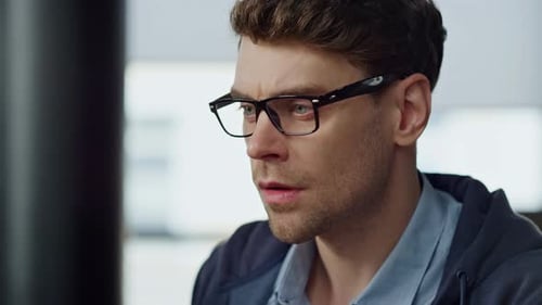 Focused It Guy Checking Online Report Closeup Pensive Businessman in Glasses