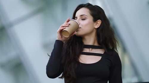Portrait Businesswoman Drinking Take Away Coffee at City Street. Confident Woman Looking