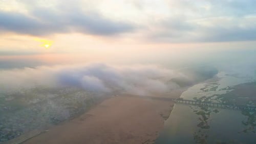 Aerial drone shot of Vijayawada city waking up to the first rays of the sun