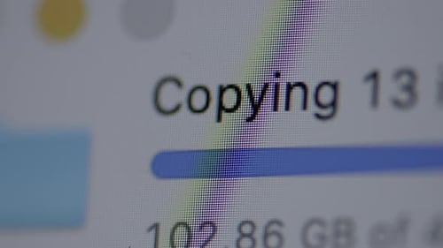 Closeup of progress bar copying data with number of GB's being copied with slow push forward.