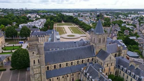 Approaching aerial movement from the Ladies Abbey of Sainte-Trinité with Michel D'Ornano park in the