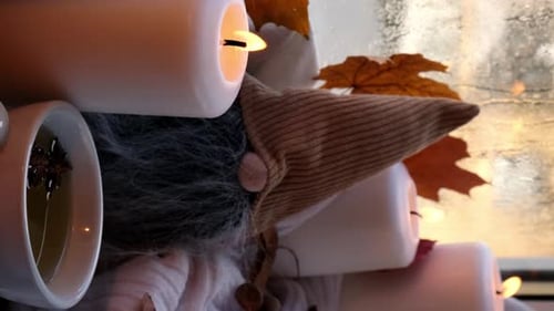 Cozy Still Life with Candles and Gnome