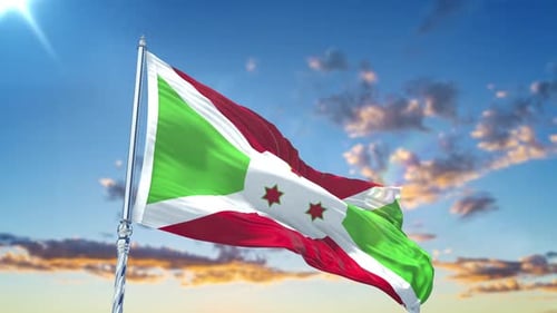 Burundi Flag Waving in Blue Sky with Clouds
