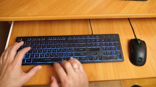 13Hands working on laptop with keyboard and mouse on wooden desk, concept of technology, internet, d