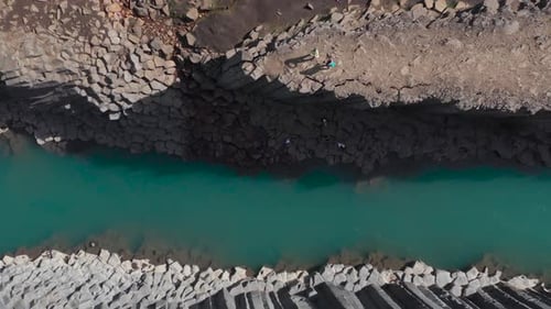 Top down of famous volcanic Stuðlagil basalt canyon in Iceland, aerial