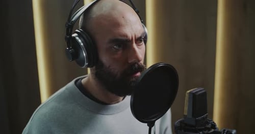 Professional Voice Actor Delivering Expressive Performance in Modern Recording Studio