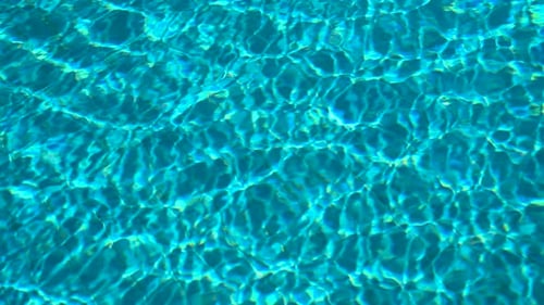 Clear Clean Water in a Pool with a Tiled Bottom