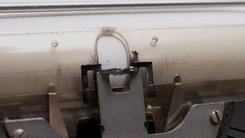 Close-Up of Typewriter Typing Words on Paper in Vintage Style
