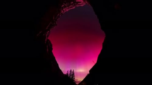 Aurora Borealis time lapse, Northern Lights over Europe. Alps mountains Austria.