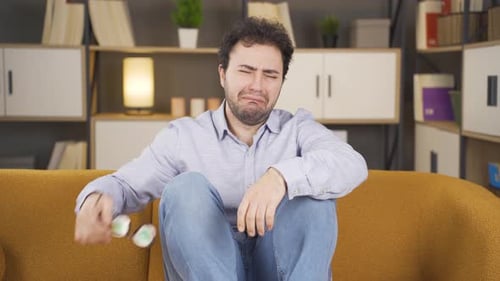 Emotional man crying.