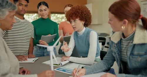 Students Discuss Renewable Energy Model in Classroom