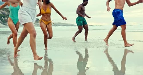 People, diversity and playing with water splash on beach for fun holiday