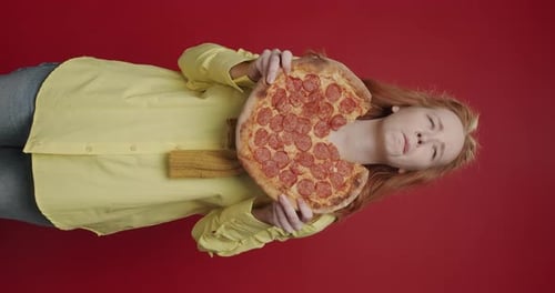 Happy Young Adult Woman Posing with Pizza