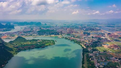 Modern cityscape High rise skyscrapers modern architecture office buildings water luxury real estat