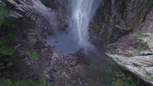 Minyon Falls - Stunning Waterfall Cascading Down Over Steep Cliff In Nightcap National Park, Norther