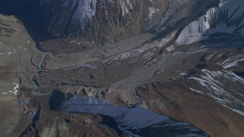 Aerial Scenic Overhead View Tilicho Base Camp Building Complex Rooftops Hidden in Himalayas