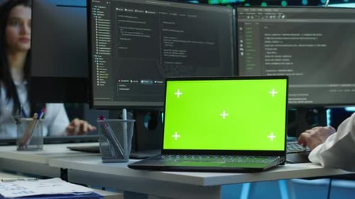 Expert in Server Room Coding on Chroma Key Notebook