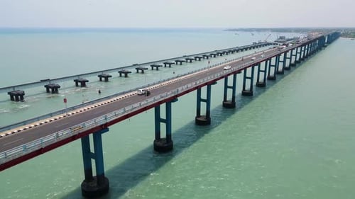 Stunning aerial drone shot of Rameshwaram city, where the bridge gracefully spans the ocean waters.