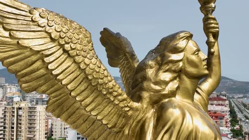 Aerial View Divine Silhouette Golden Angel at Sunset