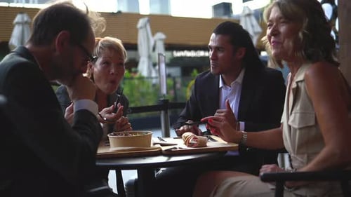 Business Lunch Meeting at Outdoor Cafe