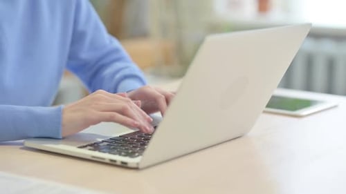 Close up of Woman Typing on Laptop