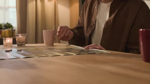 Unrecognizable Man Throwing Dice, Playing Board Game