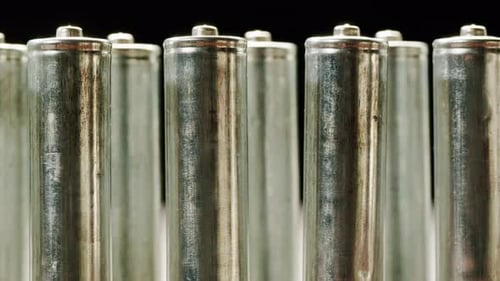 Close-Up of Silver AA Batteries in a Row