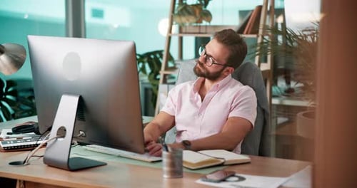 Computer, programming and web development with man coding software in office for launch or testing