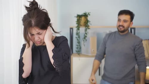 Man and Woman Arguing in the Home