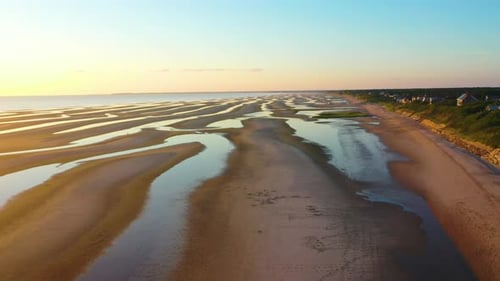Cape Cod Bay Aerial Drone Reveal Footage of Beach at Low Tide During Golden Hour with People, Sand B