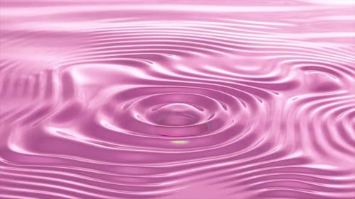 Fluid Pink Liquid Surface with Colorful Sphere Dropping and Ripples