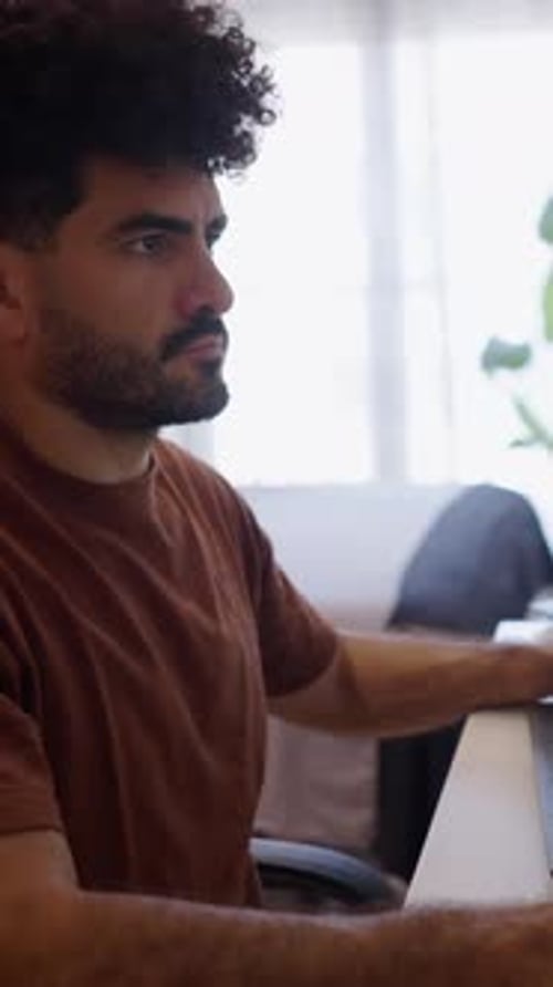 Closeup of a Venezuelan Boy Doing Concentrated Teleworking