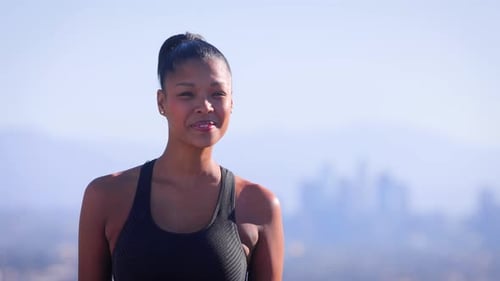 Mixed ethnicity woman Exercising in a park in Los Angeles