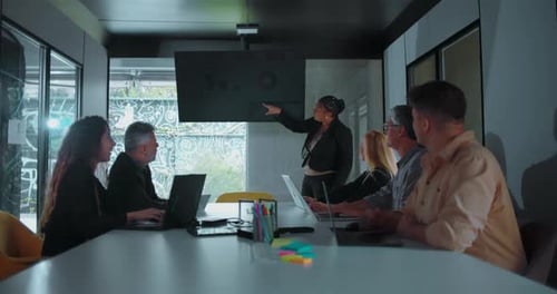 Business Presentation in Modern Office Meeting Room