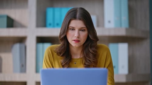 Disappointed Employee Reading Email on Laptop Sitting Company Workplace Closeup