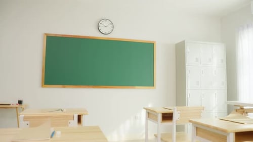 Empty Classroom with Desks and Chalkboard