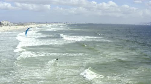 4k video footage of kite surfers surfing on a beach in Cape Town, South Africa