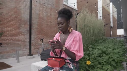 Beautiful Stylish Young Woman Using Smart Phone in Urban Courtyard Adult