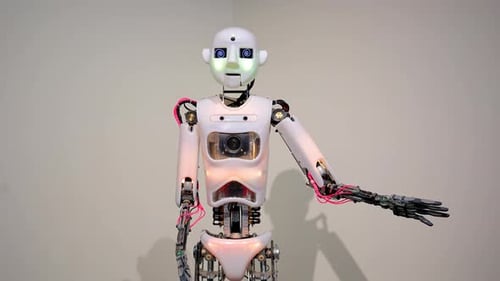 Futuristic Robot Points with Glowing Eyes