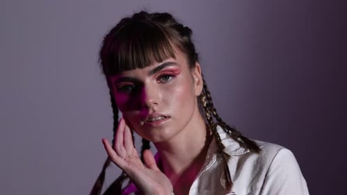 Young Woman Posing With a Unique Makeup Style