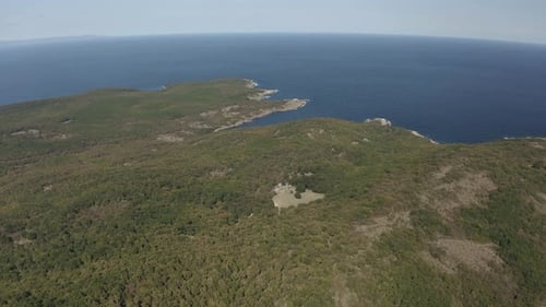 Green mountains and Black Sea of Bulgaria during sunny day - drone wide shot