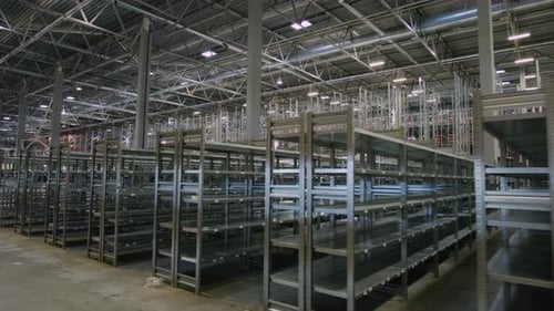 Warehouse hall with empty shelves