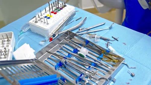 Dental instruments and equipment arranged on table