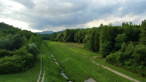 Lake Butoniga Croatia water canal tributary system with low flow, Aerial drone low flyover shot