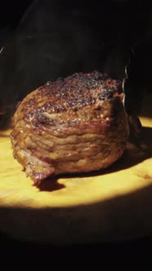 Close Up of Cooked Meat with Rosemary