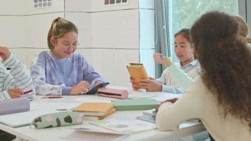Multiethnic Kids Doing School Project Together