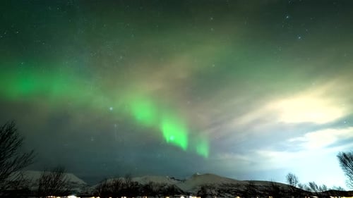 Aurora Borealis Over Broskar Fjord, Norway, Northern Lights Amidst Clouds
